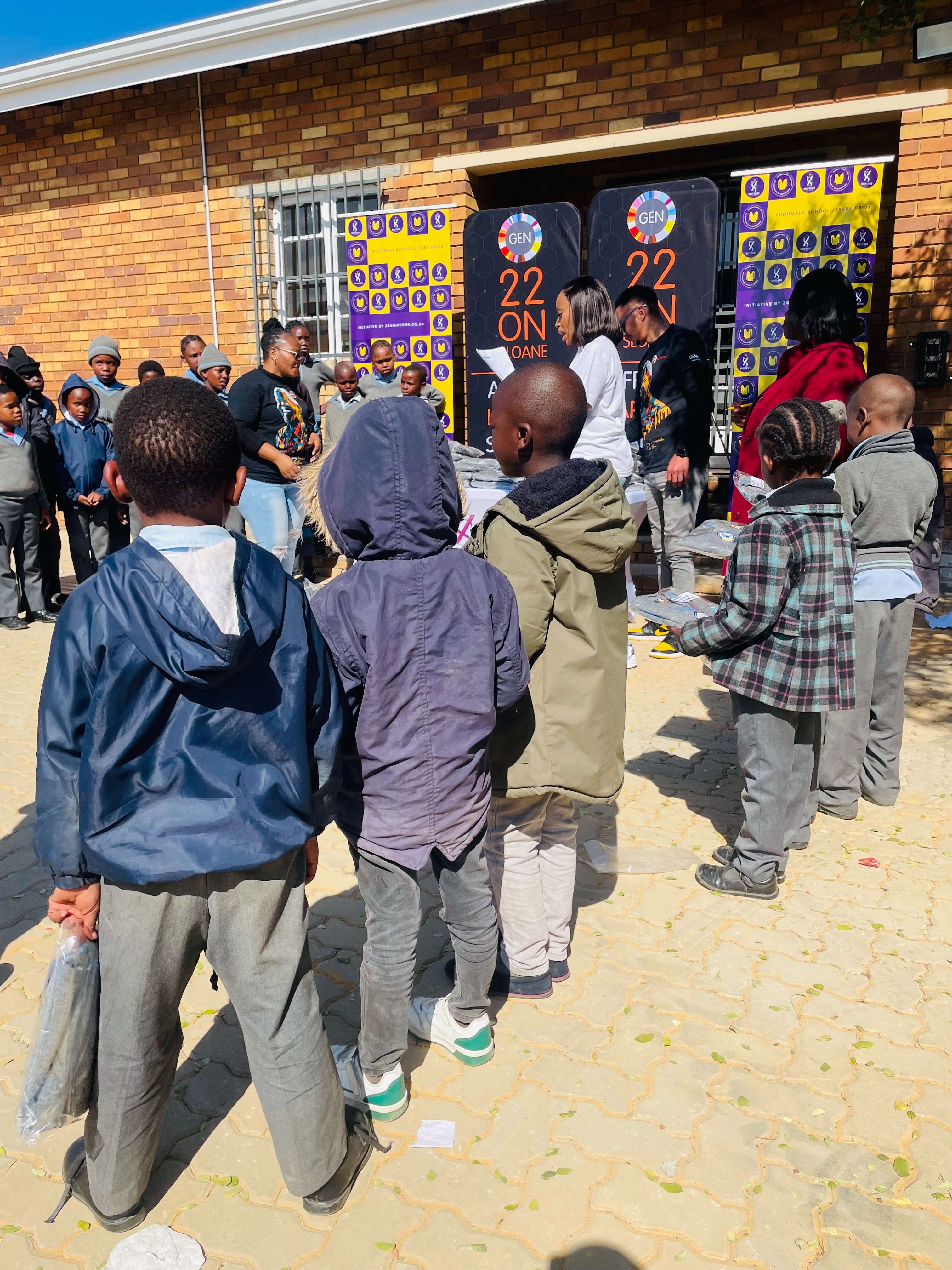 Uniform distribution ceremony with students and community